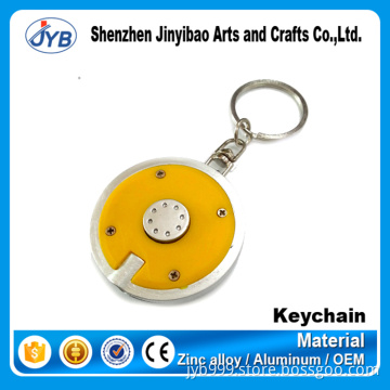 custom logo plastic cheap round shape LED keychain for promotion
